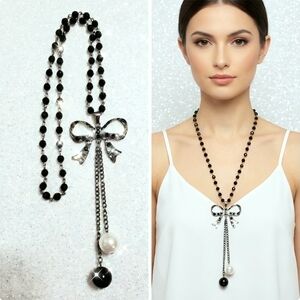 Silver plated black-and-white beaded crystal bow necklace